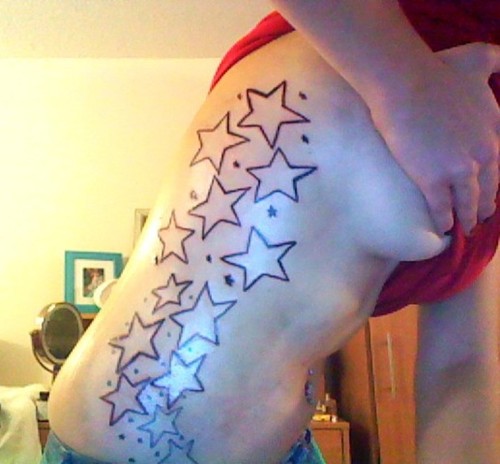star tattoos side body