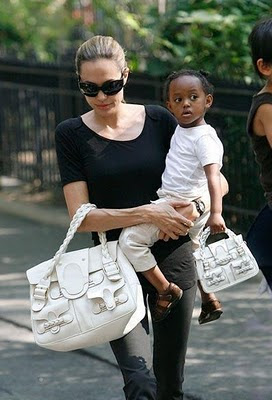 Angelina Jolie And Her Daughter Bring A Valentino Histoire Bag
