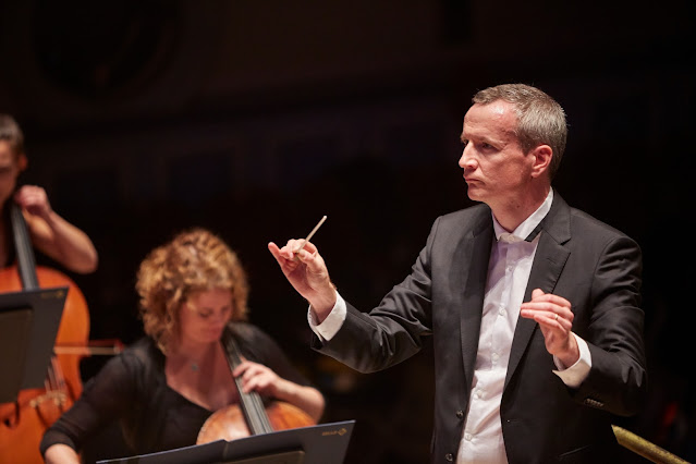 Garry Walker conducting the Orchestra of Opera North. (Photo Justin Slee)