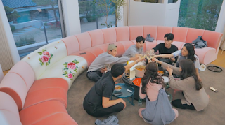 Disney Plus 'Pink Lie' cast members making a toast during the first meeting