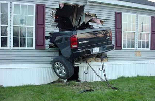 Truck smashed into house