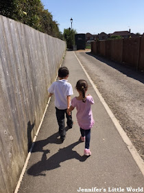 Children walking down footpath together