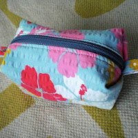 Boxy pouch with pleats