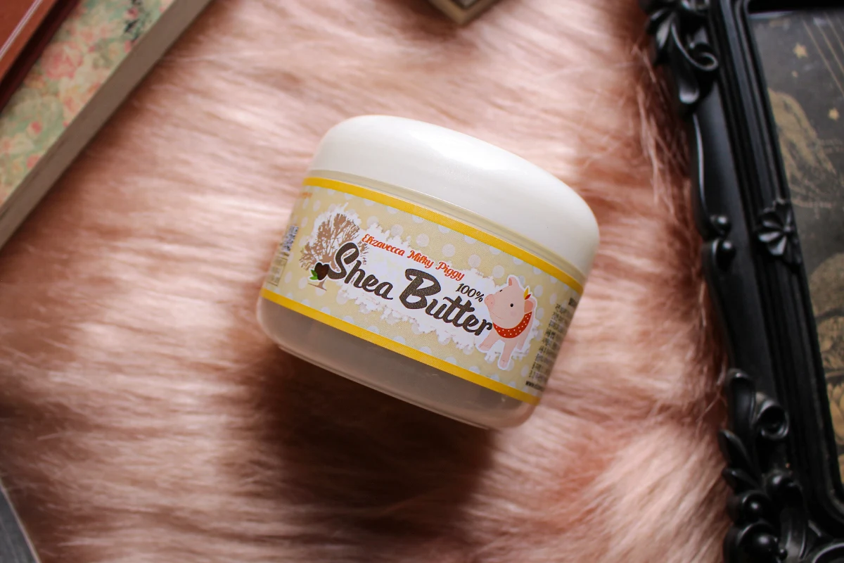 close-up picture of an opened container with raw shea butter by Korean brand Elizavecca