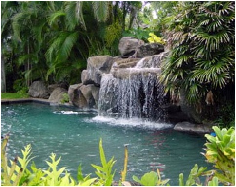 SWIMMING POOL WITH ARTIFICIAL CASCADE AND WATERFALLS