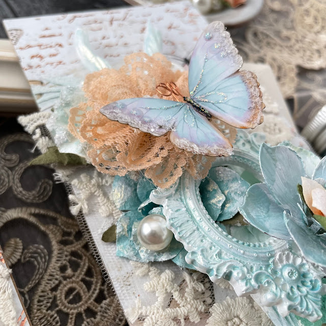 Mixed media panels created with: Prima Marketing apricot honey, peach tea, coffee break flowers, mechanicals grungy succulents, opal magic paint, moulds; Reneabouquets butterflies, glitter glass; Tim Holtz baubles