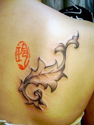 Great Design Upper Back Tattoo