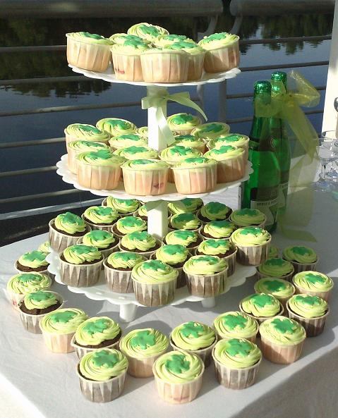 And a green and yellow wedding cupcake tower