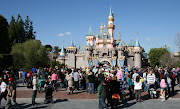 The Disneyland version, however, is only 77 feet high, using forced . (castle )