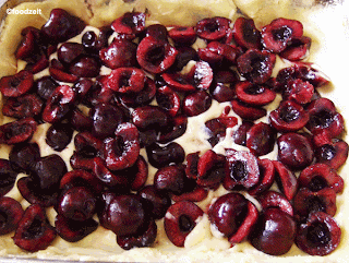 cherries laid out on the pudding mixture