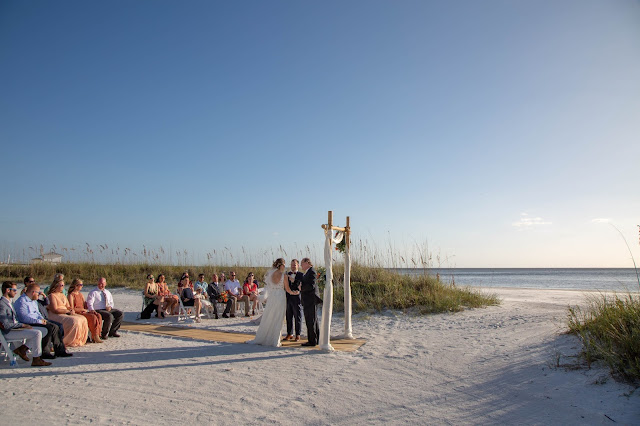 Tropical wedding ceremony on Fort Myers beach.