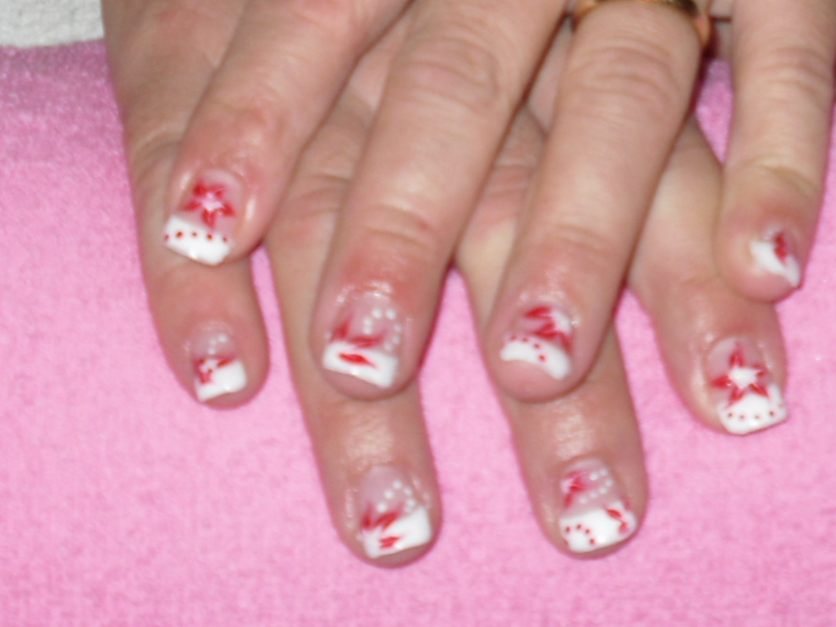 White French UV gel system with red flowers and spots