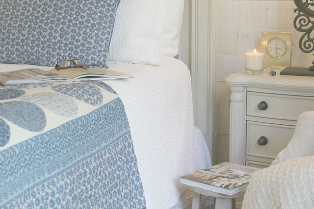 Beautiful blue moon quilt in bedroom with romantic country decor by Hello Lovely Studio