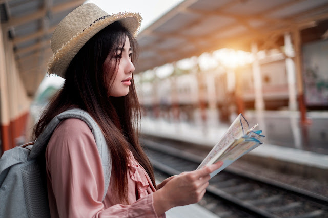 Woman Holding Map