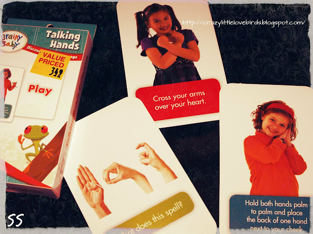 Picture showing talking hands by brainy baby, showing sign language