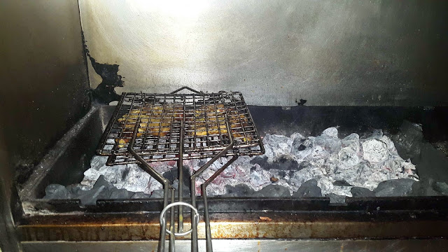 Al Faham Chicken being grilled at Empire