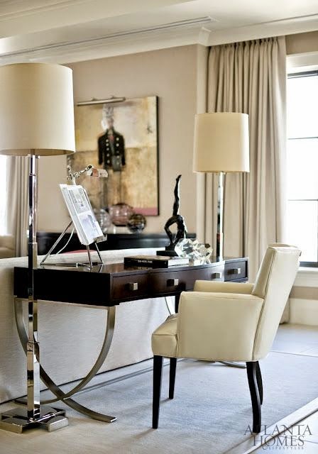 beautiful traditional neutral family room with floor lamps
