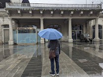 Outside view of museum with umbrella