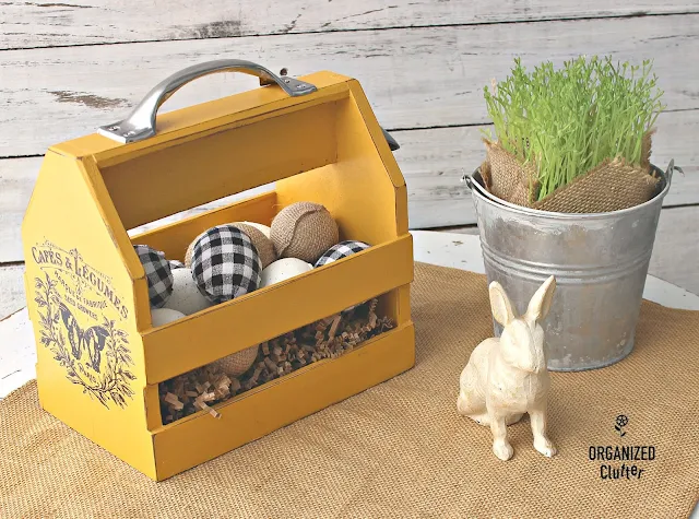 Thrifted Wooden Bottle Caddy Upcycled As Easter/Spring Decor #thriftshopmakeover #dixiebellepaint #colonelmustard #Easterdecor #redesign #primamarketing #imagetransfer
