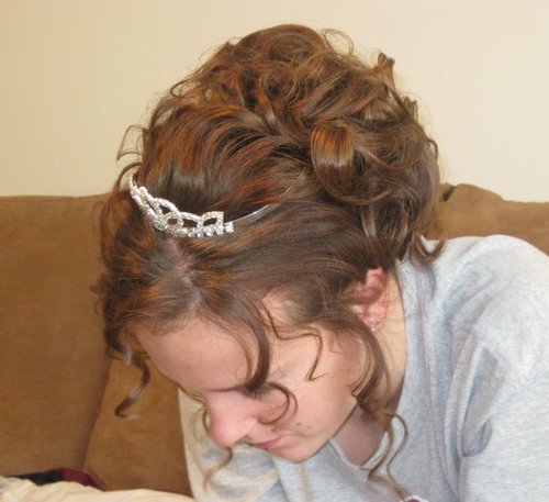 Homecoming curly updo hairstyle