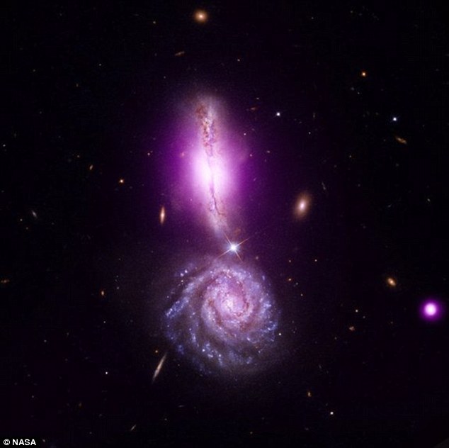 Perlanggaran antara dua galaksi menghasilkan tanda seruan 