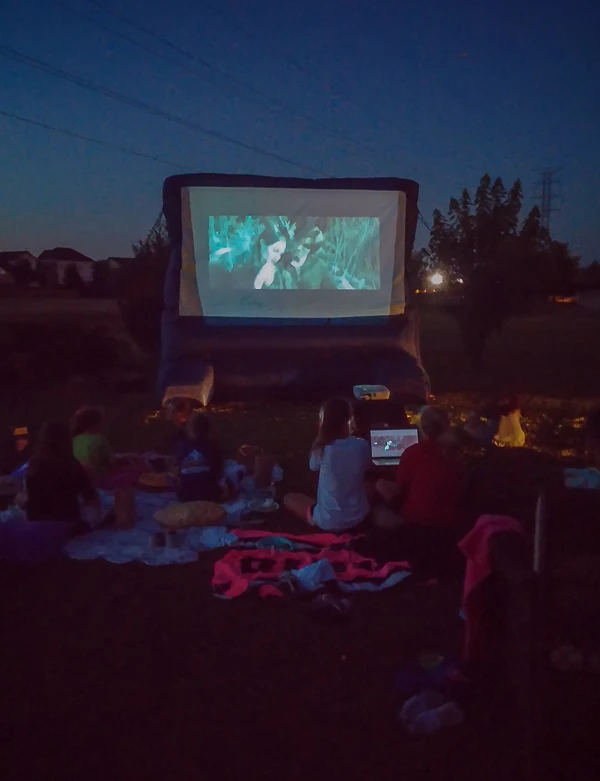 watching Maleficent on outdoor inflatable movie screen