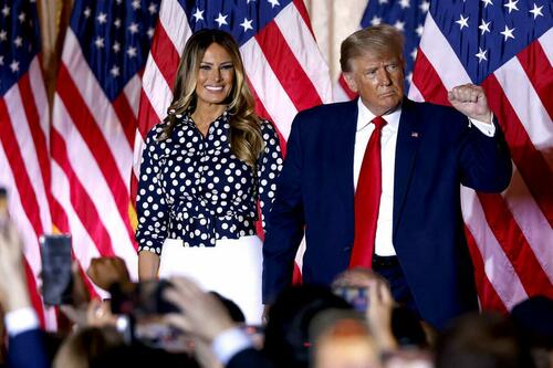 Former U.S. President Donald Trump, joined by former First Lady Melania Trump, arrives to speak at the Mar-a-Lago Club in Palm Beach, Fla., on Nov. 15, 2022.