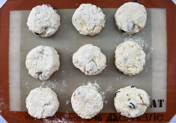 Making Blueberry Lemonade Scones - Step 5 - cut scones on lined baking tray