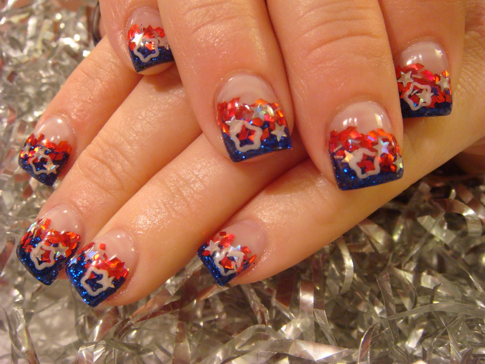 More 4th of July nails. The white stars are made with an impression 