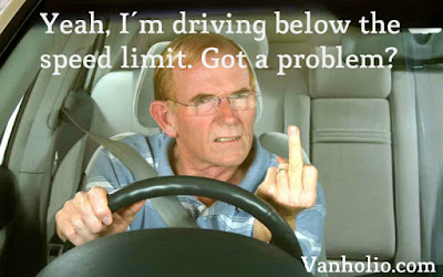 Elderly male driver flips middle finger. Text reads, “Yeah, I’m driving below the speed limit. Got a problem?” Vanholio.com