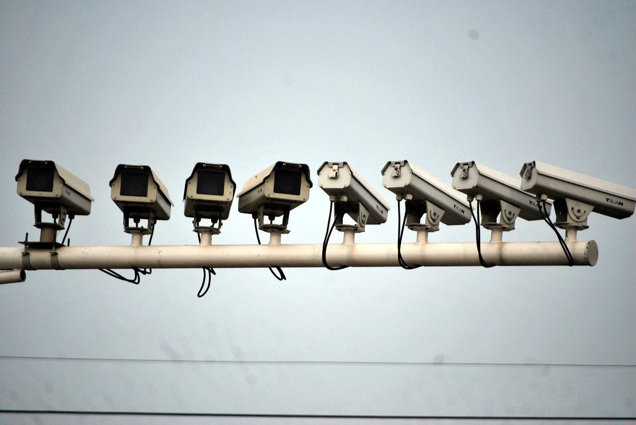Traffic surveilance cameras watching.