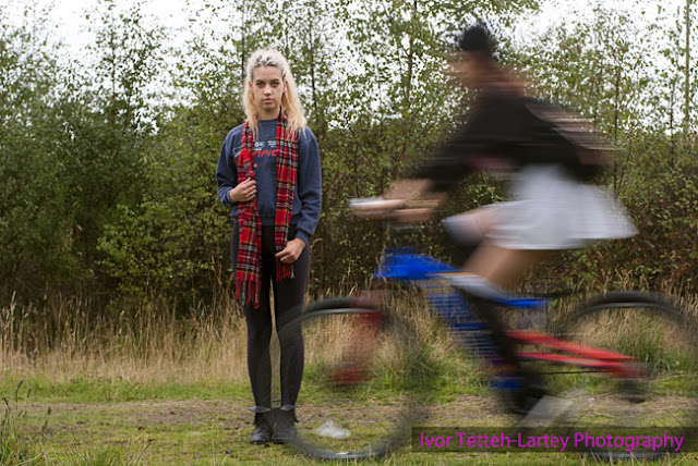 Woman cycling on a bike.