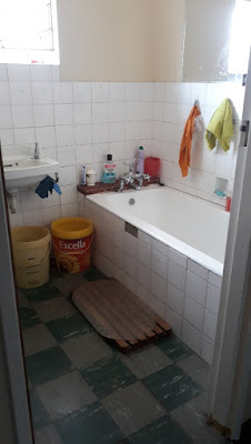 tiled family bathroom and toilet