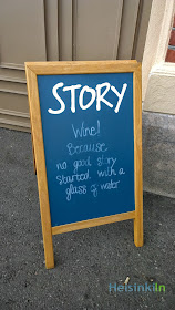 Wine! Because no good story started with a glass of water