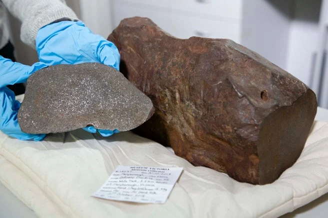 The Maryborough meteorite, with a slab cut from the mass. (Melbourne Museum)