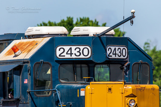 A close up of the Dometic air conditioners and the remote-control antennae on 2430's cab.