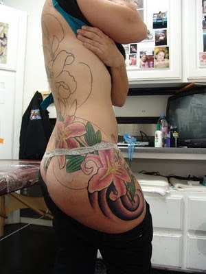 Lilly Tattoo Design on Butt. Big flower design tattoos on Butt.