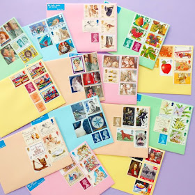 colourful envelopes decorated with vintage postage stamps