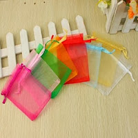 http://www.specialgiftboxes.com/product/tulle-favor-bag-set-of-24/