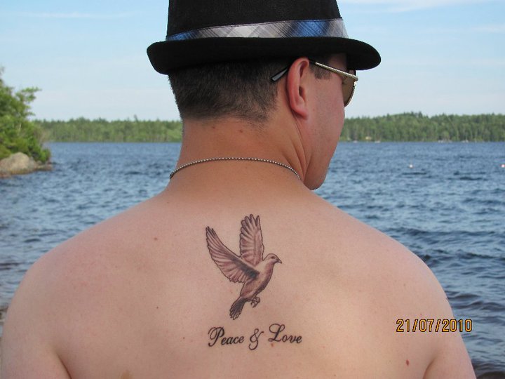 I know the Dove can be a popular tattoo but I thought it represented my 