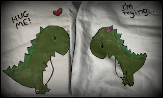 couple pillows t-rex