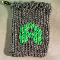 the letter A rendered in knitting
