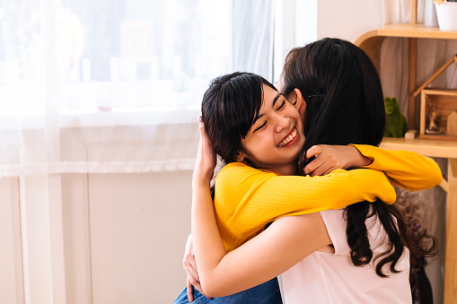 Women hugging eachother