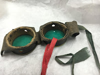 back of green goggles