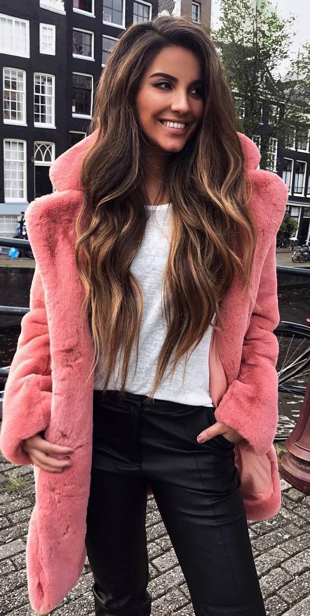 what to wear with a pink fur coat : tee and black pants