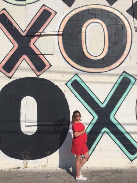 Las vegas mural, off the shoulder dress, converse. raybay aviators, red hair, easy maternity outfit