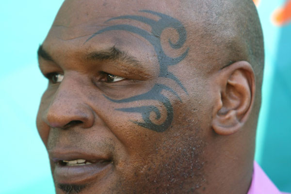 Mike Tyson Tribal Tattoo. Random Tattoo Quote: "It's only his outside; 