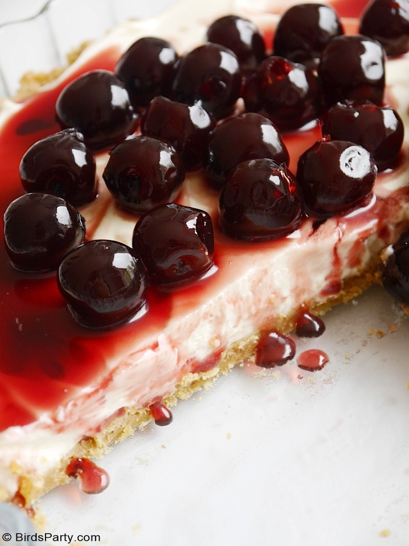 No-Bake Cherry Cheesecake Recipe - quick and easy to make summer dessert that's perfect for a BBQ, potluck backyard party or 4th of July celebrations! by BirdsParty.com @BirdsParty #cherrycheesecake #cherries #nobakedessert #summercheesecake #cheesecake #4thofjuly #dessert #nobakecheesecake #summerberries #summerdessert #nobakedessert