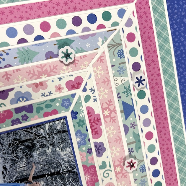 12x12 Winter Wonderland Scrapbook Page with strips of colorful paper