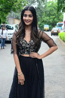 Actress Pooja Hegde Stills in black dress at Valmiki movie Press Meet